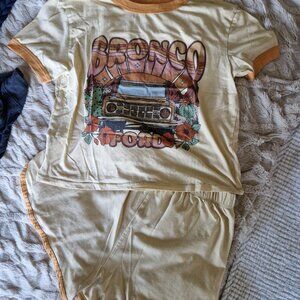 Tan and orange Ford Bronco graphic tee and shorts, shorts got a small stain